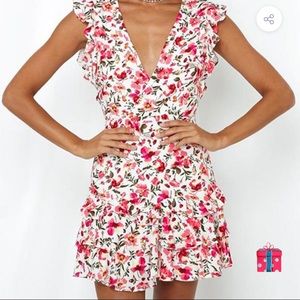 Flower mini dress with cut out in the back